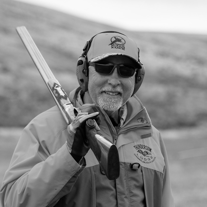 Hunter in the field with shotgun